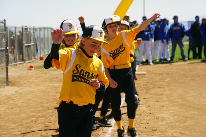 Players are turning third base and heading home!