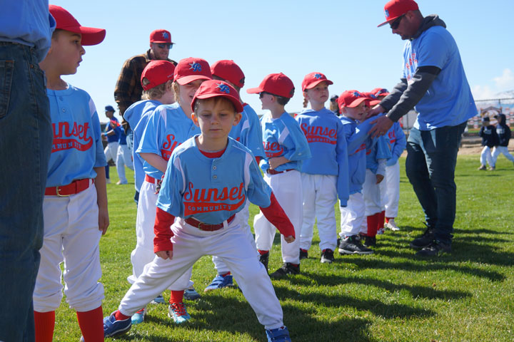 Teams lineup up before being announced and running the bases on opening day.