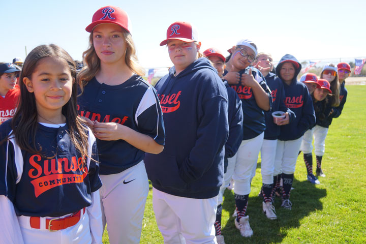 Teams lineup up before being announced and running the bases on opening day.