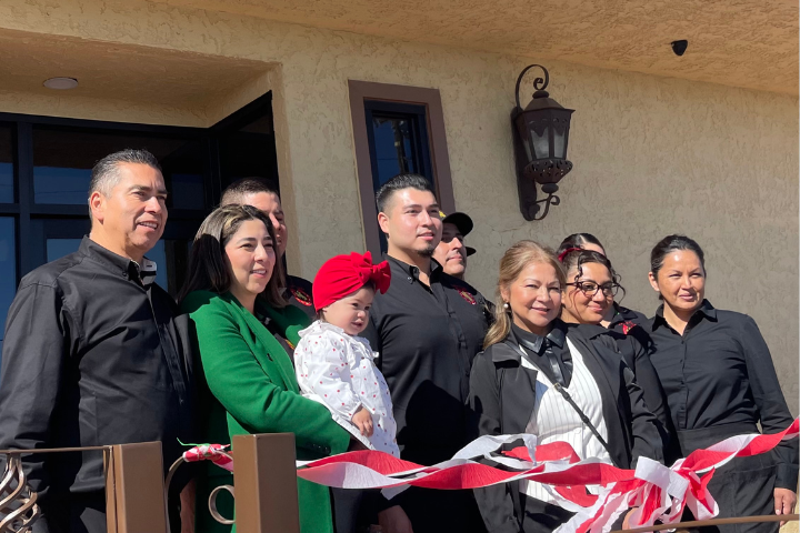 Rodeo Cafe owners, family, and their staff celebrate the grand opening on Friday morning, April 19th.