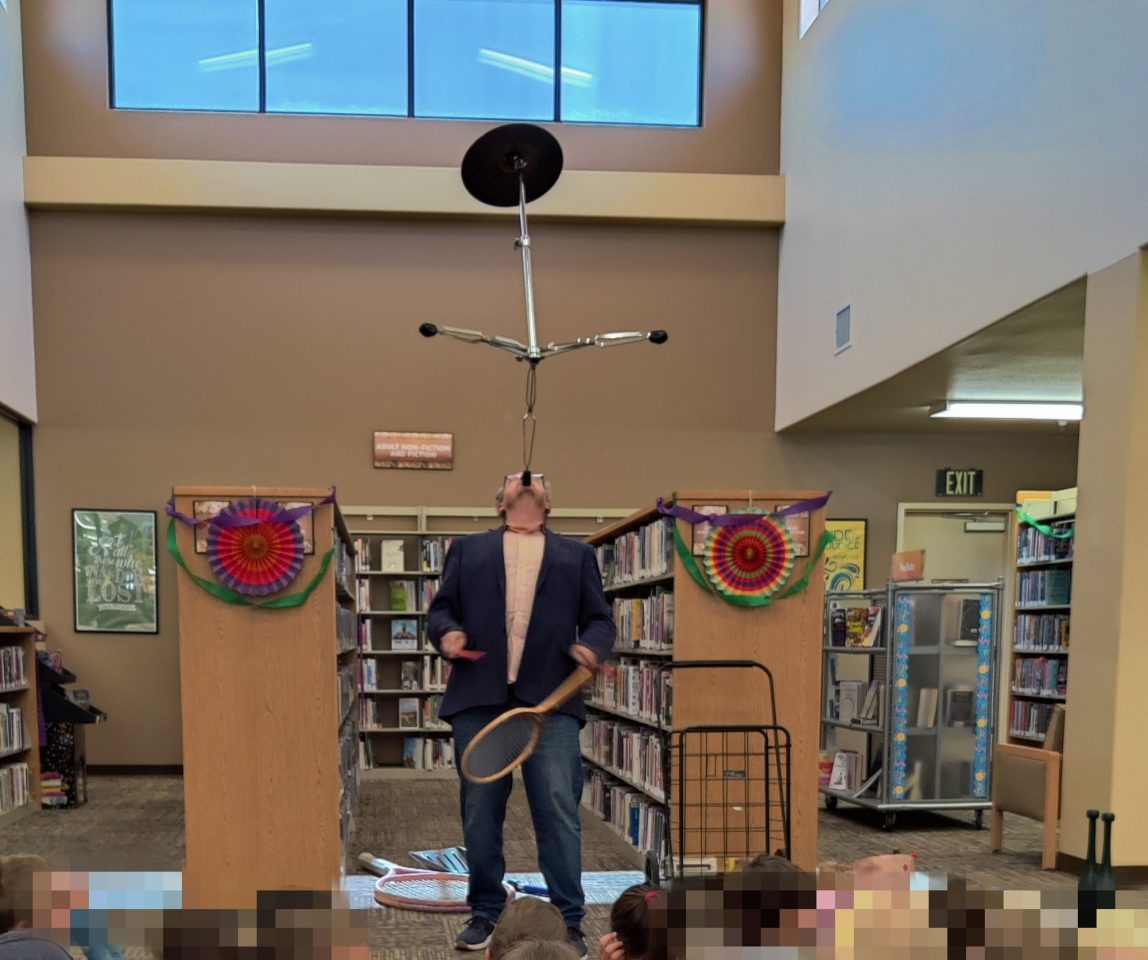 Juggler, Michael Rayner, performing at Phelan Memorial Library Reading Program