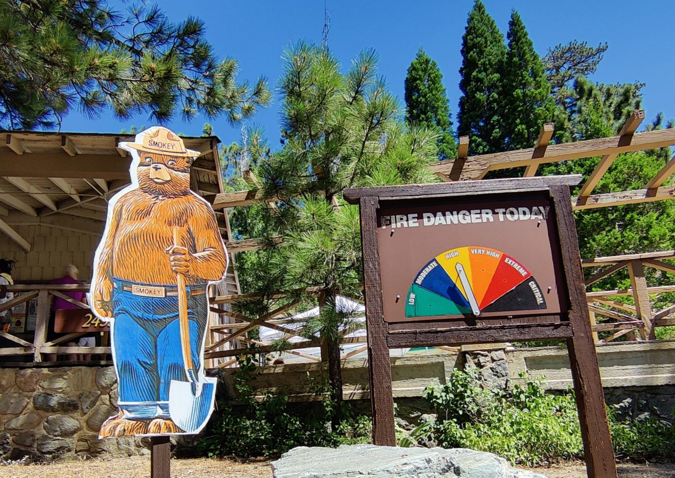 Smokey with his Fire Danger sign outside of the Big Pines Visitor Center.