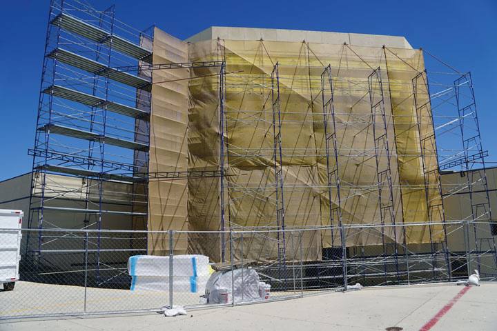 Recent construction at Serrano High School's Performing Arts Center involved repairing siding panels that had deteriorated to the point that they became dislodged and fell to the ground during high winds earlier in the year.