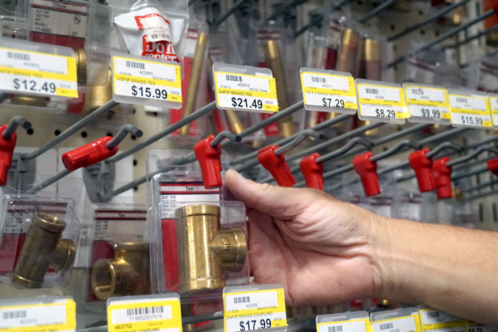 Hands off: You can no longer grab what you need off the shelf. Mills Hardware and Mountain Hardware have started securing products in cages and on pegs to prevent would-be thieves from stealing high-theft items, ranging from brass fittings to chainsaws. At Mountain Hardware, employees have to unlock the peg to retrieve the product you need.