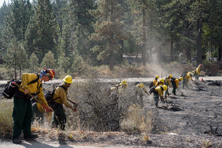 Work crew mopping up the fire near Flume Canyon.