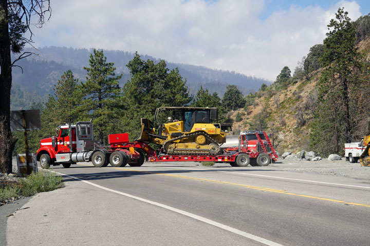 More dozers are heading out to cut the containment line.