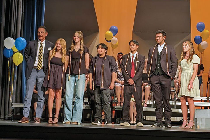 June: Superintendent's Honor Roll Recipients are pictured with their chords displayed around their necks, which will be worn during graduation.