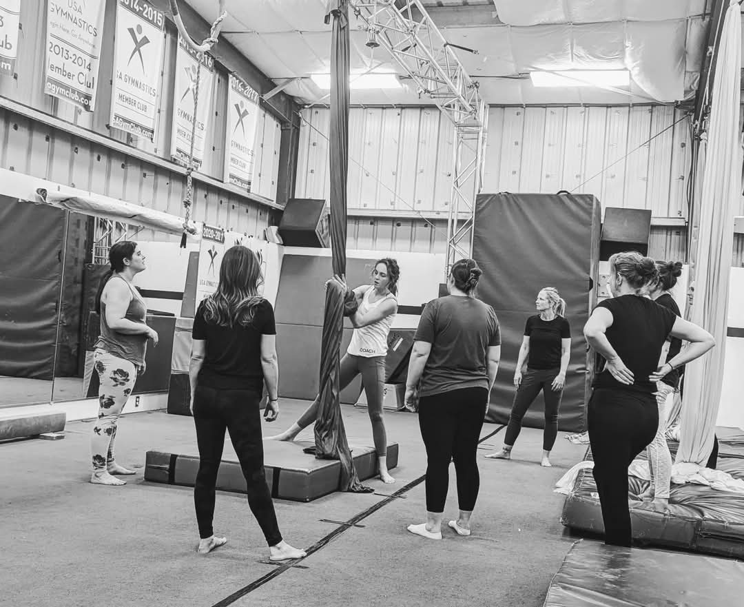The Adults Aerial Silk Class Learning How To Properly Wrap.