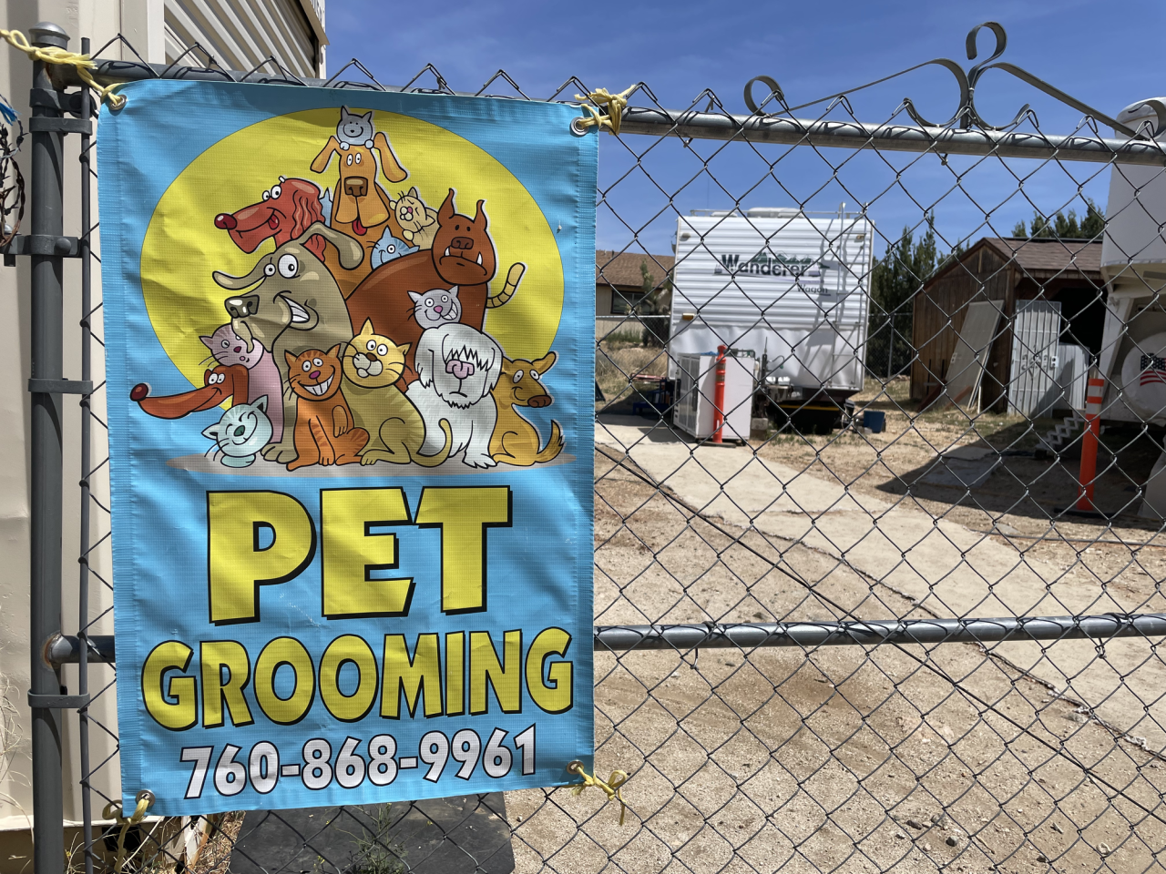 Barkingham Palace's new Pinon Hills location features two grooming trailers inside a secure, fenced area.