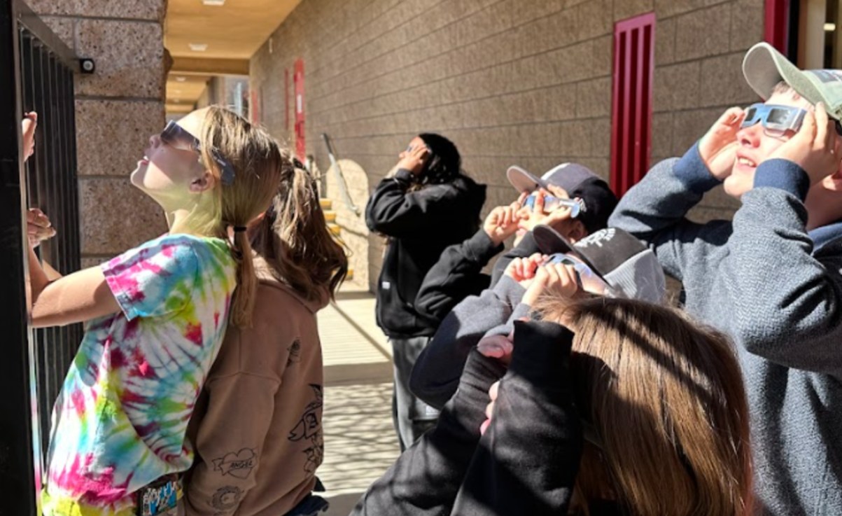 Students taking a break from the classroom to experience first-hand the solar eclipse!