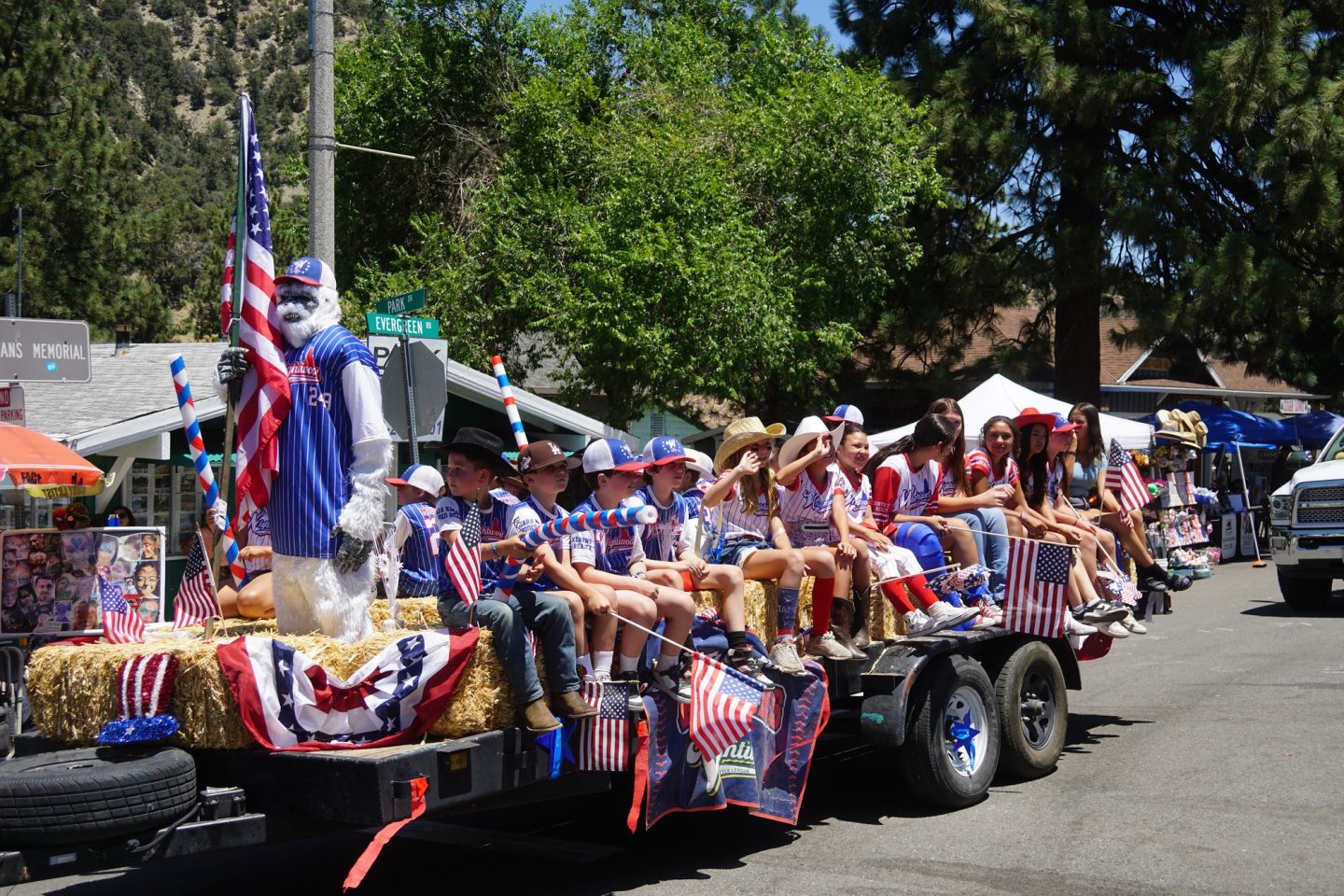 Wrightwood All Stars are enjoying a ride in the parade.