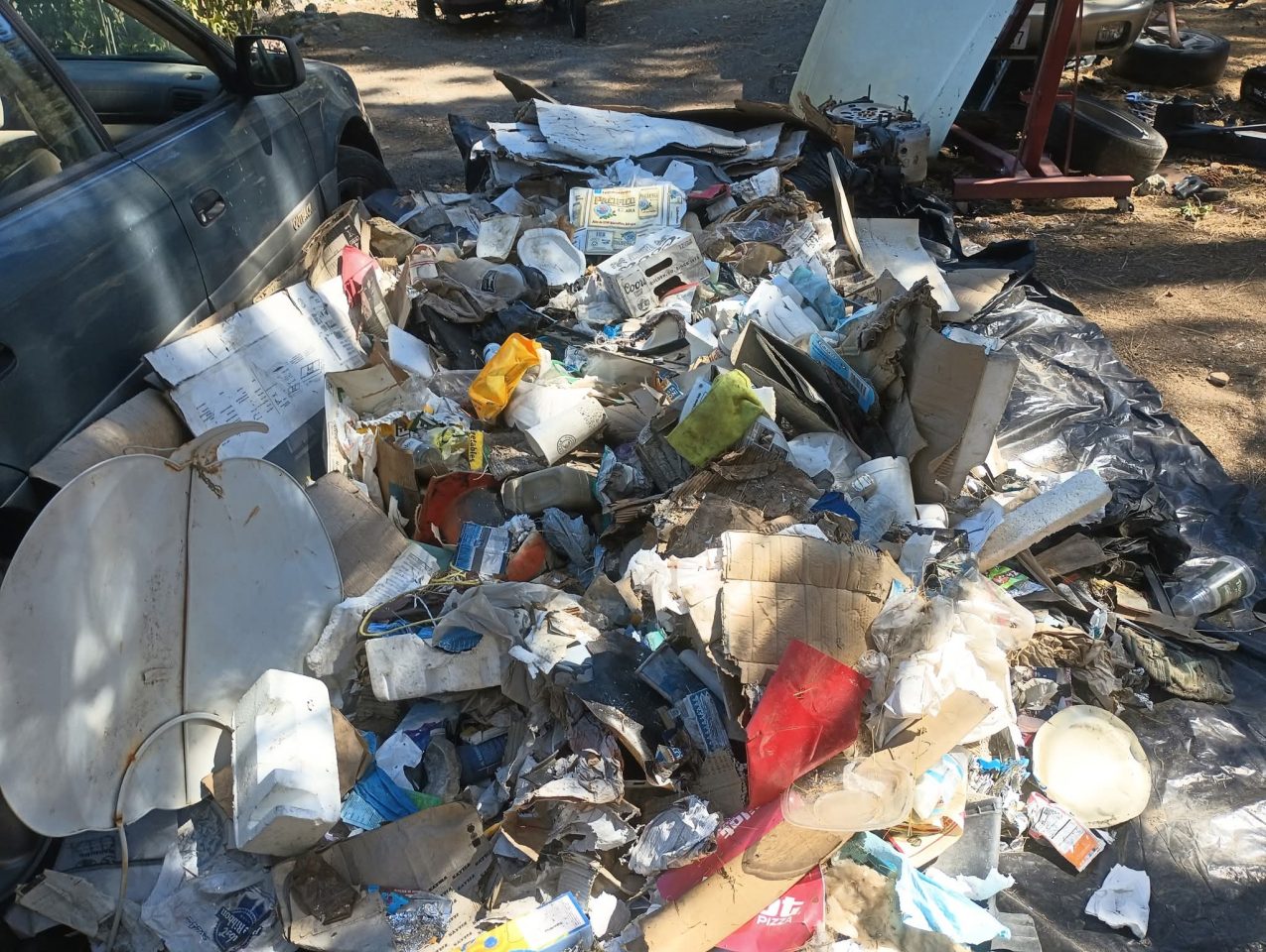 An example of trash dumped before the clean-up process.