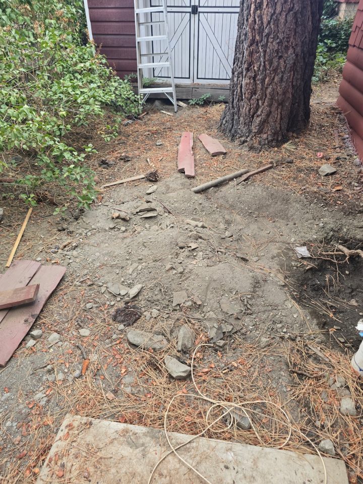 The bear did some redecoration in the backyard while digging out a personal drinking hole!