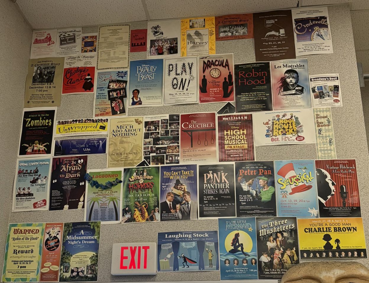 In chronological order, starting with Annie, Playbills were hung on the classroom wall.