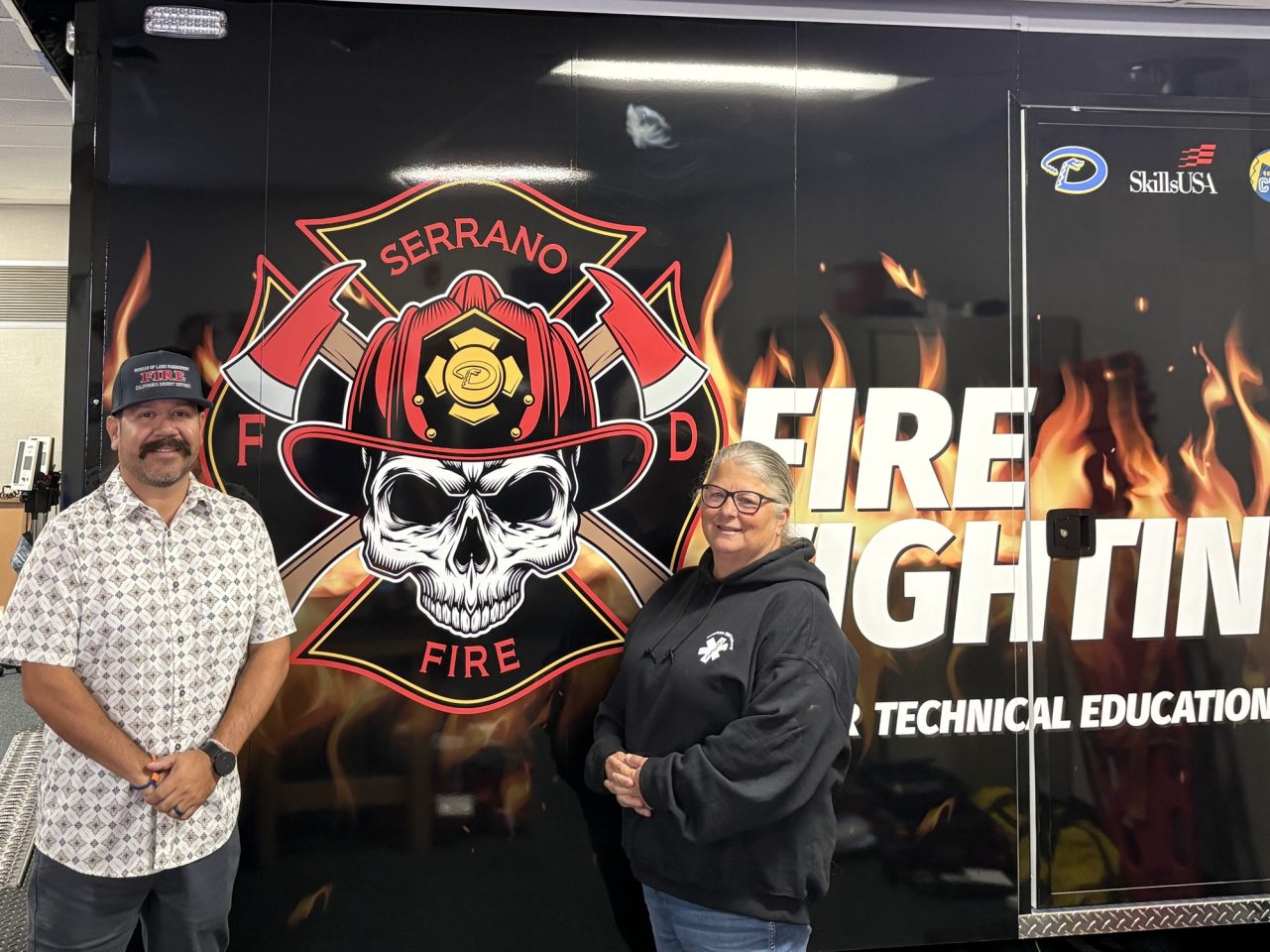 Robert Chacon, pictured to the far right, proudly stands alongside his fellow Educator.