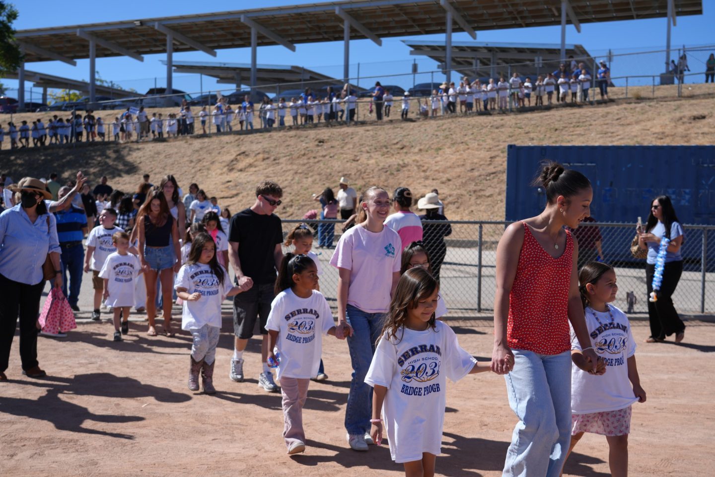 Students are starting their journey to cross the bridge and enter the next phase of life.
