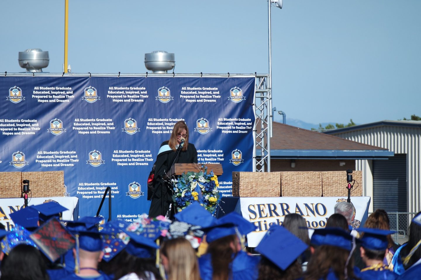 Principal Lisa Hansen delivers her speech to the class of 2026