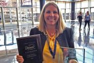 Congrats, Jen!: Jennifer Connor holds her award at the California FFA State Leadership Conference in Ontario, where the Serrano High School staff member was recognized for her support of agricultural education programs. Photo credit: Snowline Schools