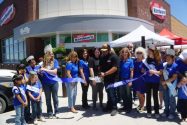 The ribbon cutting ceremony at Mills Hardware Grand Opening Celebration in Phelan. Photo credit: Don Fish Jr.